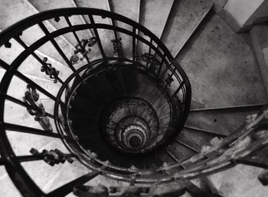 Spiral staircase leading downward.  © Patrick Down https://creativecommons.org/licenses/by-nc/2.0/
